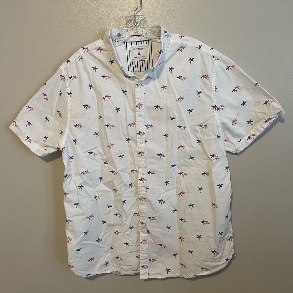 Men's White Short Sleeve Button Down with American Flag Pattern on Palm Trees.